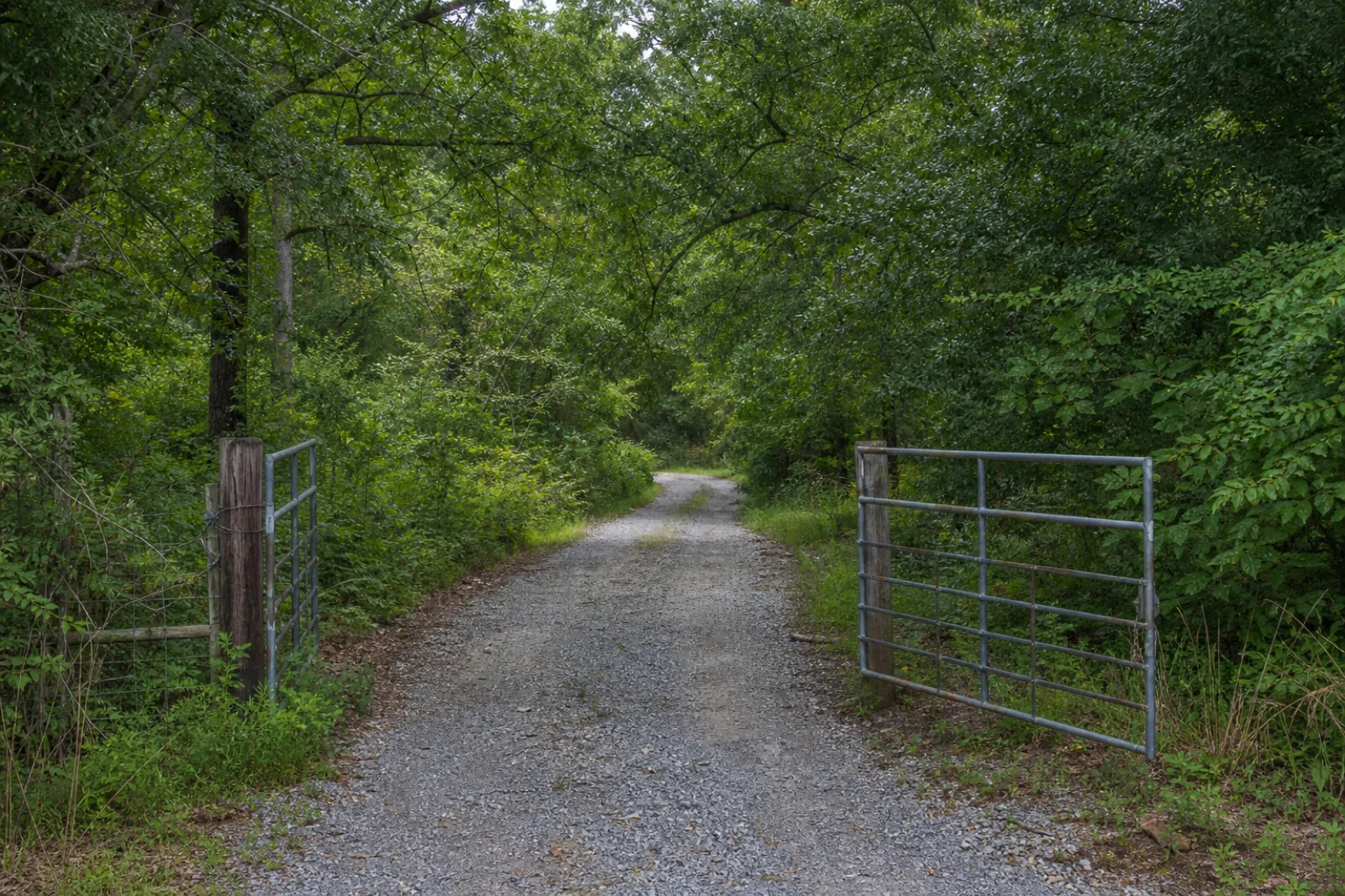 Conceptual gravel entrance and gate used to illustrate equipment access questions